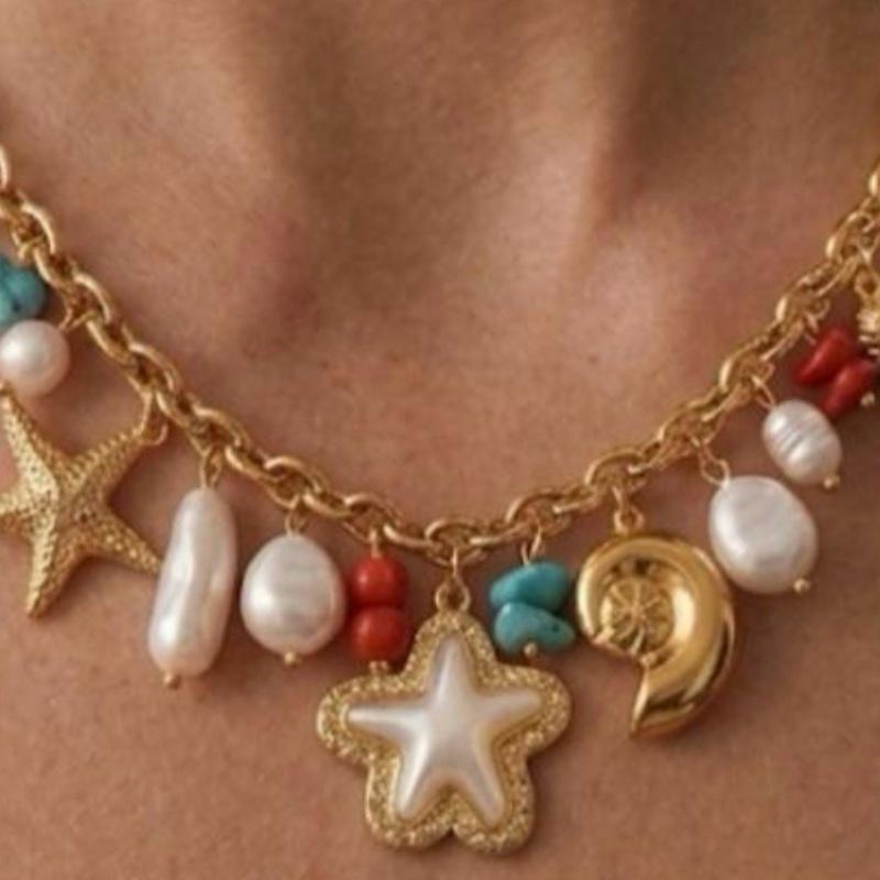 Collana In fondo al mar acciaio 316 L con charms a forma di stelle e perle per un look marino elegante