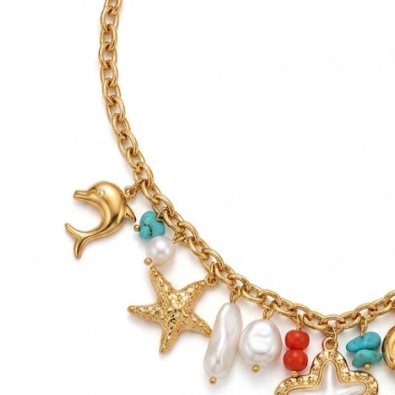 Collana In fondo al mar acciaio 316 L con charms a forma di stelle e perle per un look marino elegante