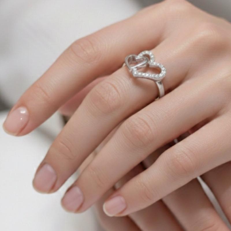 Anello Eros: Il Simbolo del Tuo Legame in Acciaio con Design Cuore Brillante per Donna