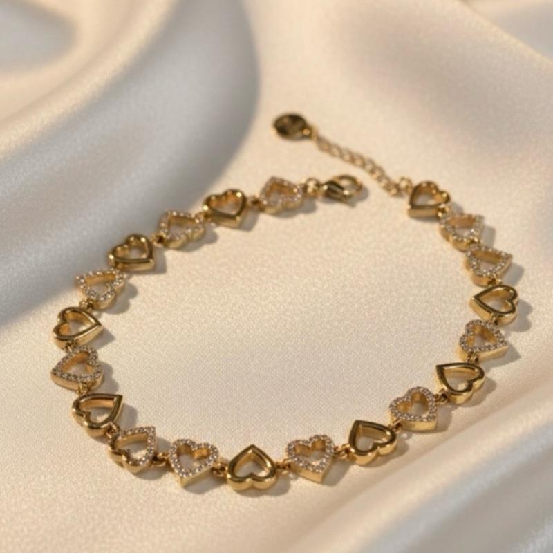 Bracciale COR A COR con Cuori Stilizzati e Zirconi Bianchi Elegante e Romantico per un Stile Femminile