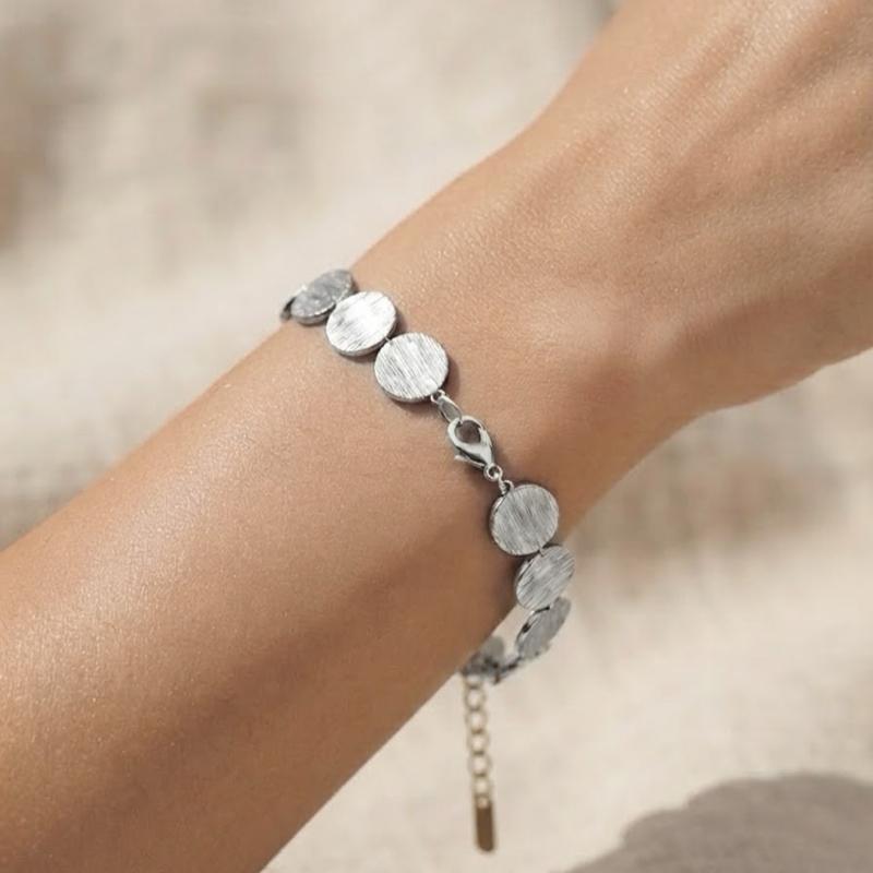 Bracciale Soleil in Acciaio Inossidabile con Disegno a Dischi Dorati e Argentati per un Look Elegante e Moderno
