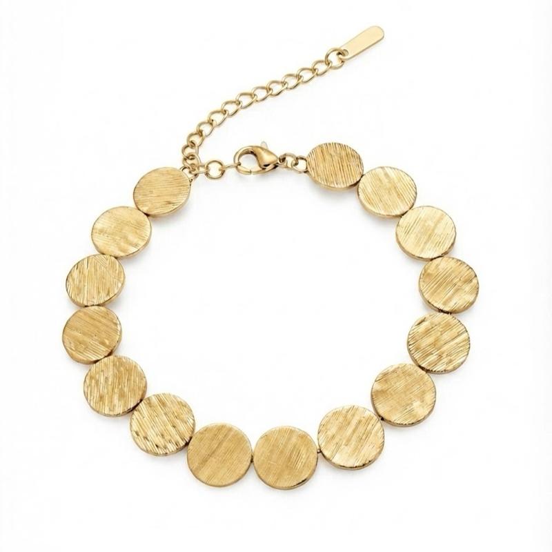 Bracciale Soleil in Acciaio Inossidabile con Disegno a Dischi Dorati e Argentati per un Look Elegante e Moderno