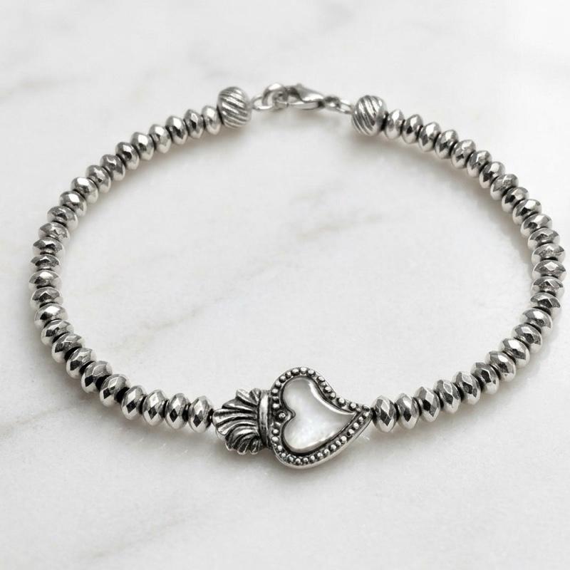 Bracciale TANGO in Acciaio Smerigliato con Perline Eleganza Rustica e Simbolismo del Cuore Sacro Perfetto per Look Unici