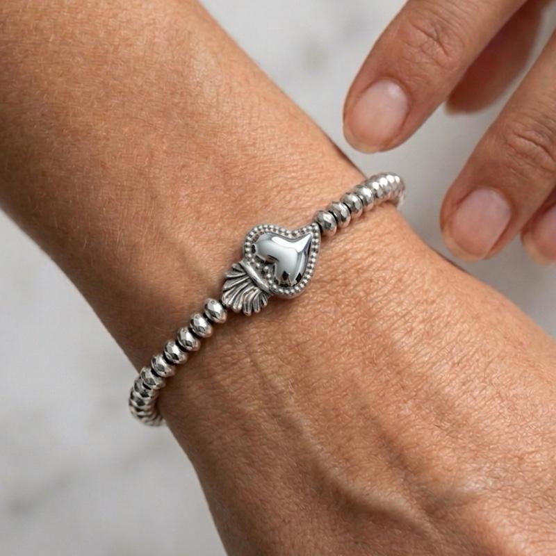 Bracciale TANGO in Acciaio Smerigliato con Perline Eleganza Rustica e Simbolismo del Cuore Sacro Perfetto per Look Unici