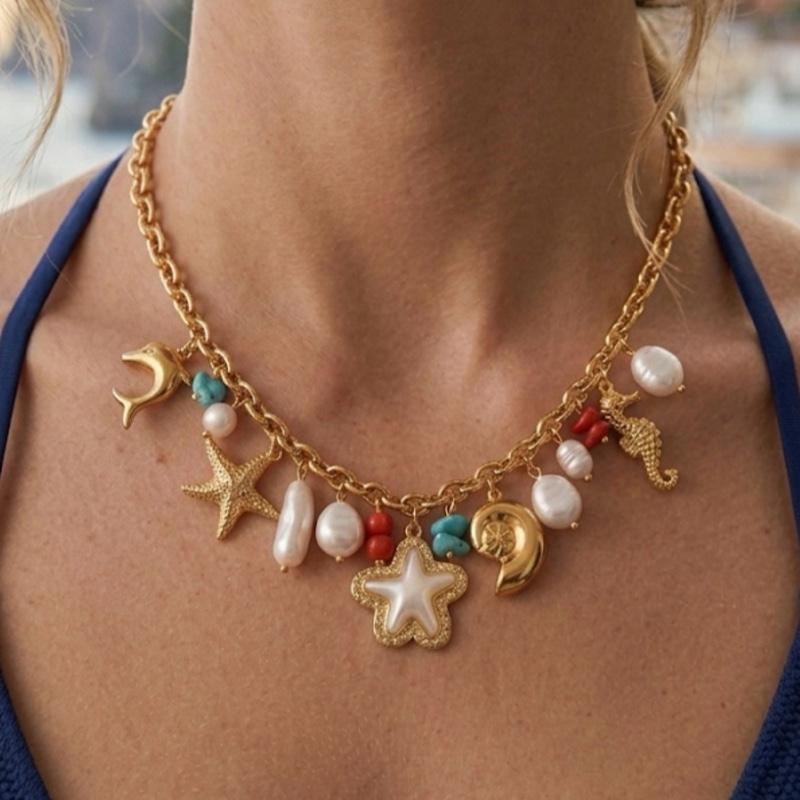 Collana In fondo al mar acciaio 316 L con charms a forma di stelle e perle per un look marino elegante